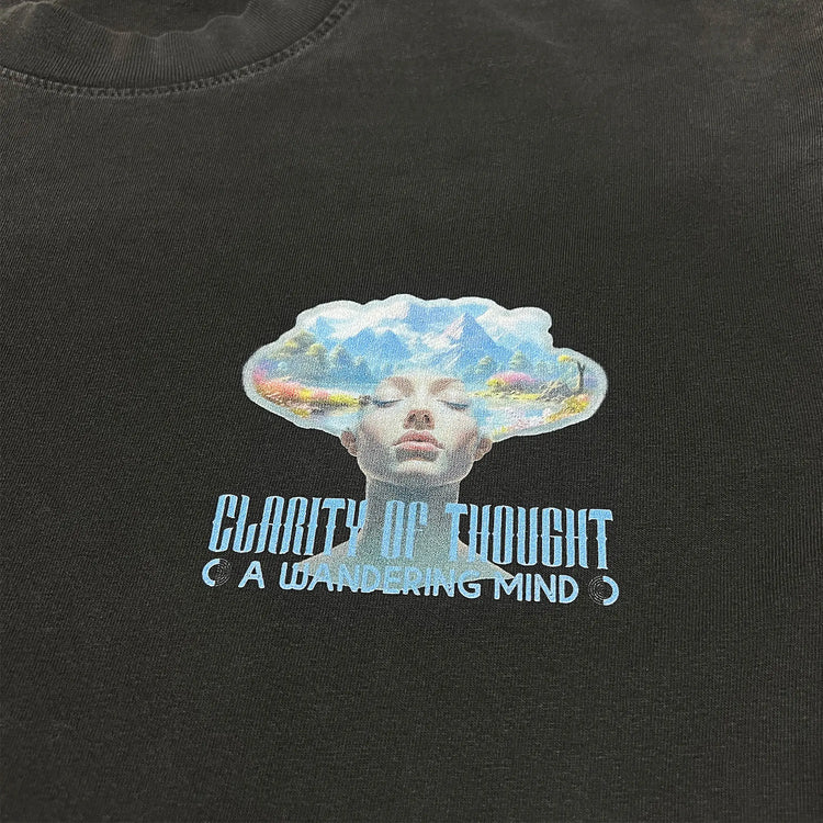 A Wandering Mind Clarity of Thought t-shirt in vintage black front graphic detail showing human profile, mountains, lake