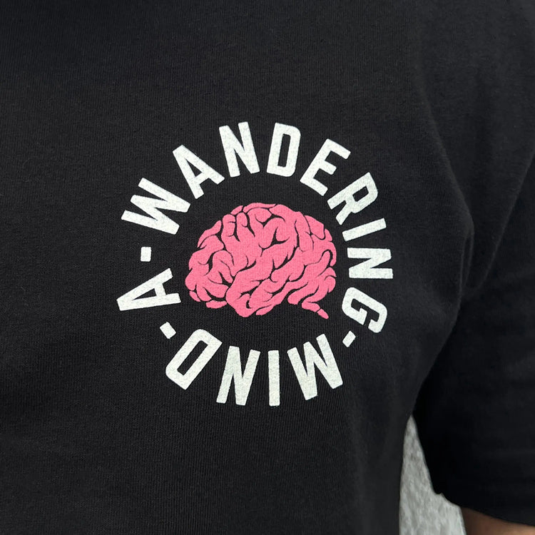 A Wandering Mind The Mystic t-shirt in black front graphic detail showing brain and typography