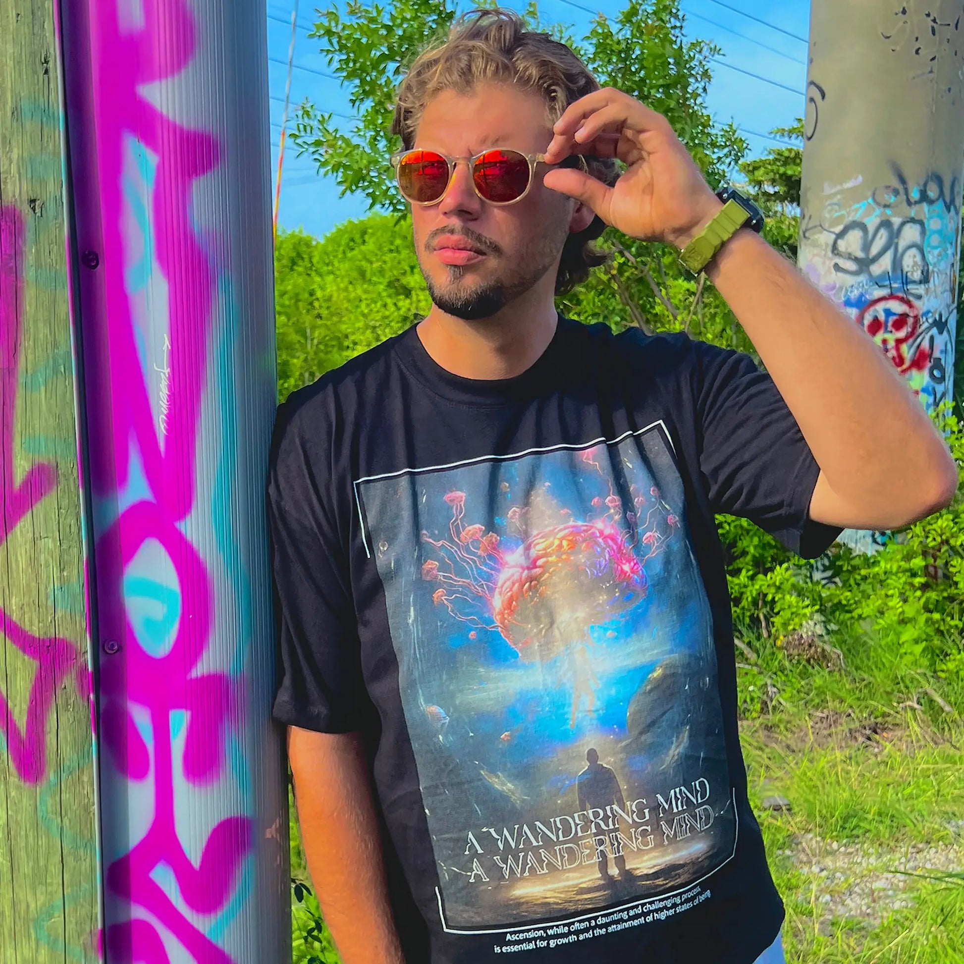 A Wandering Mind Ascension t-shirt in black front view worn on model