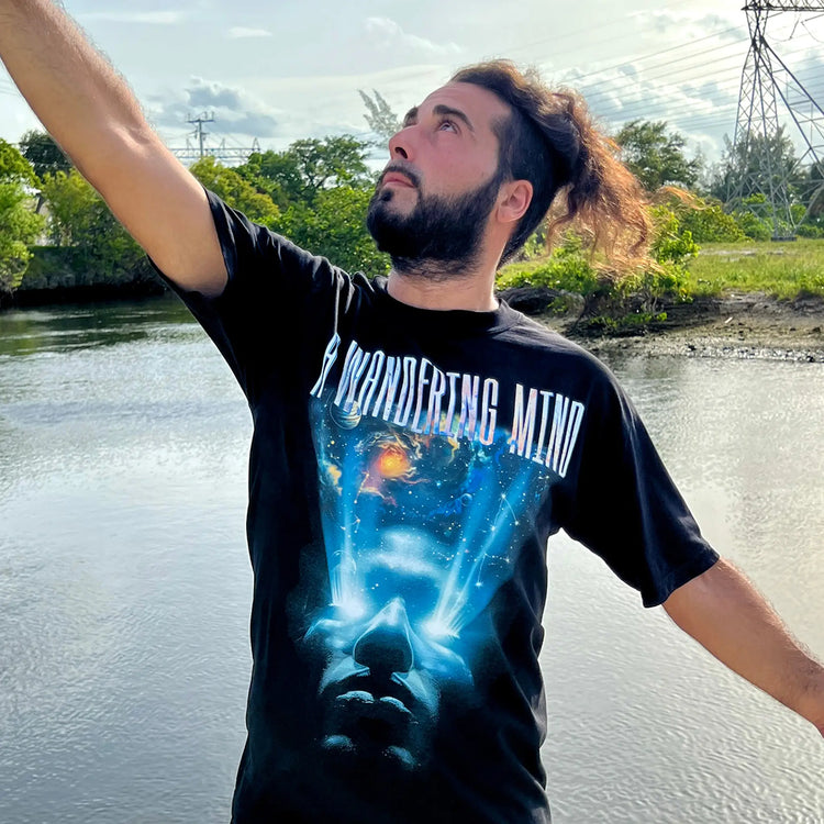 A Wandering Mind Awakening t-shirt in black front view worn on model