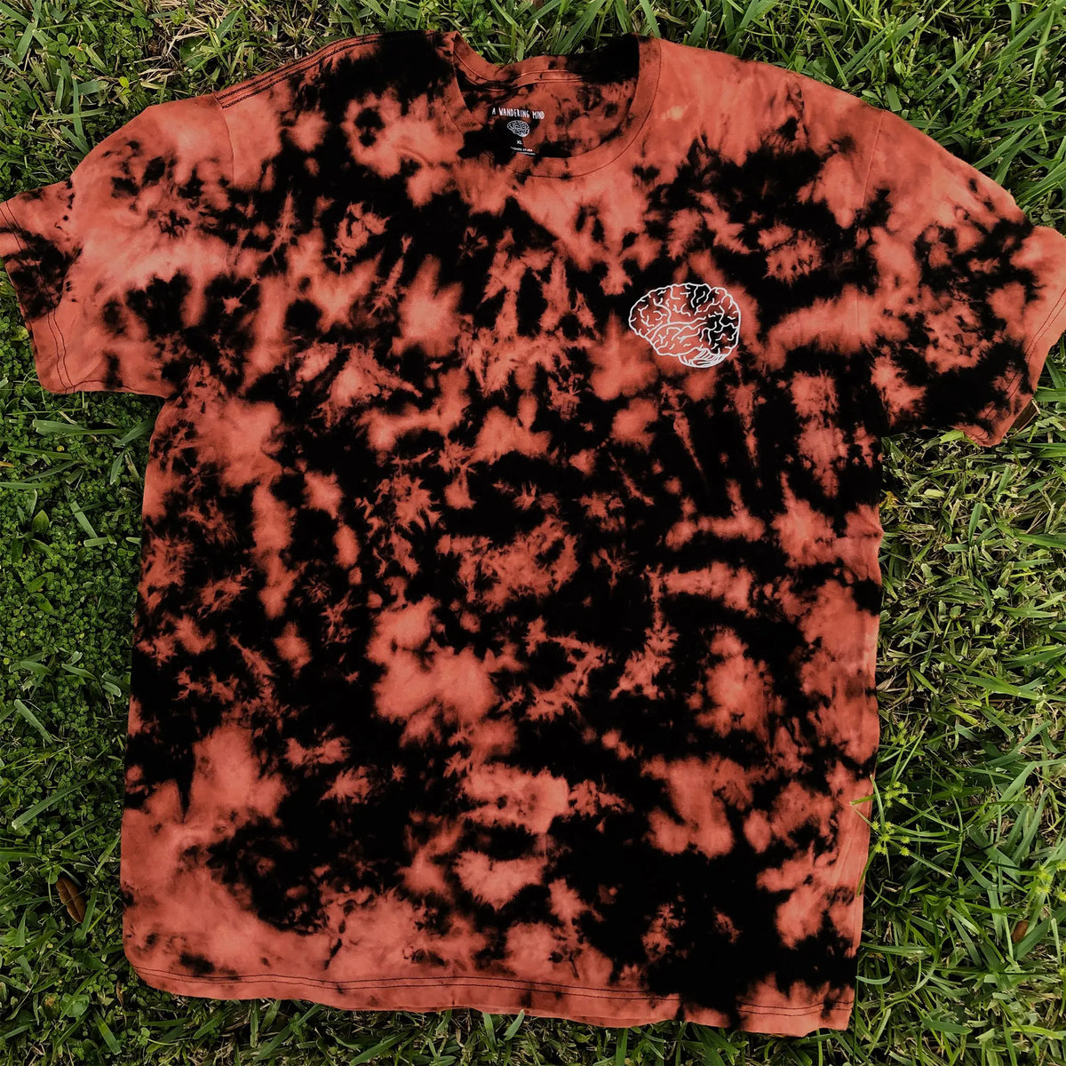 A Wandering Mind Classic Brain White Logo t-shirt in bleach-dyed black front view