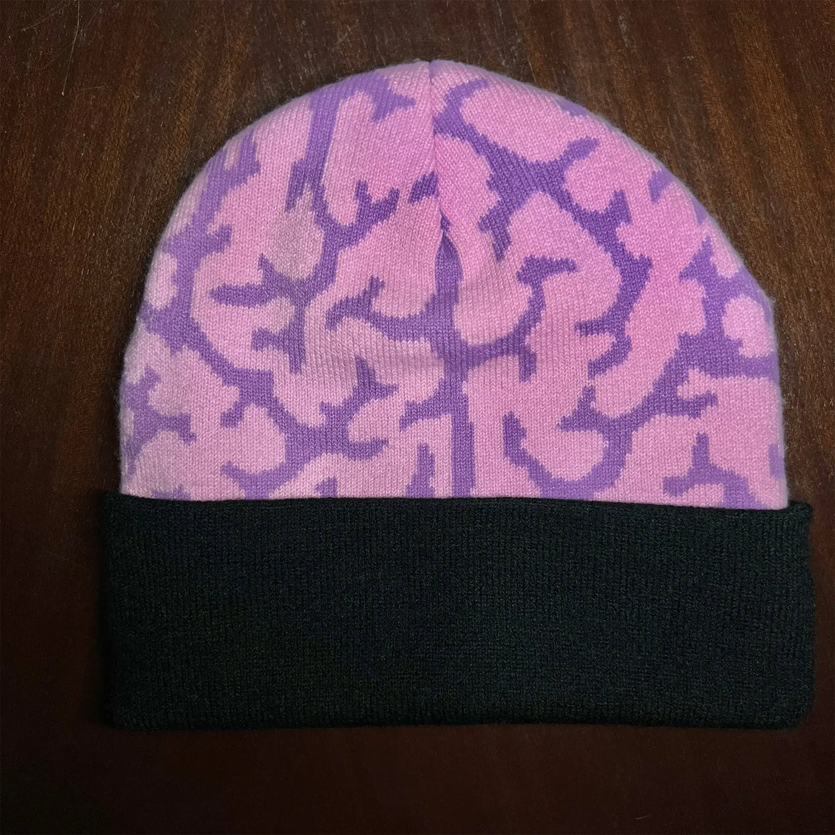 A Wandering Mind Brain beanie in violet featuring all-over brain pattern knit texture detail 