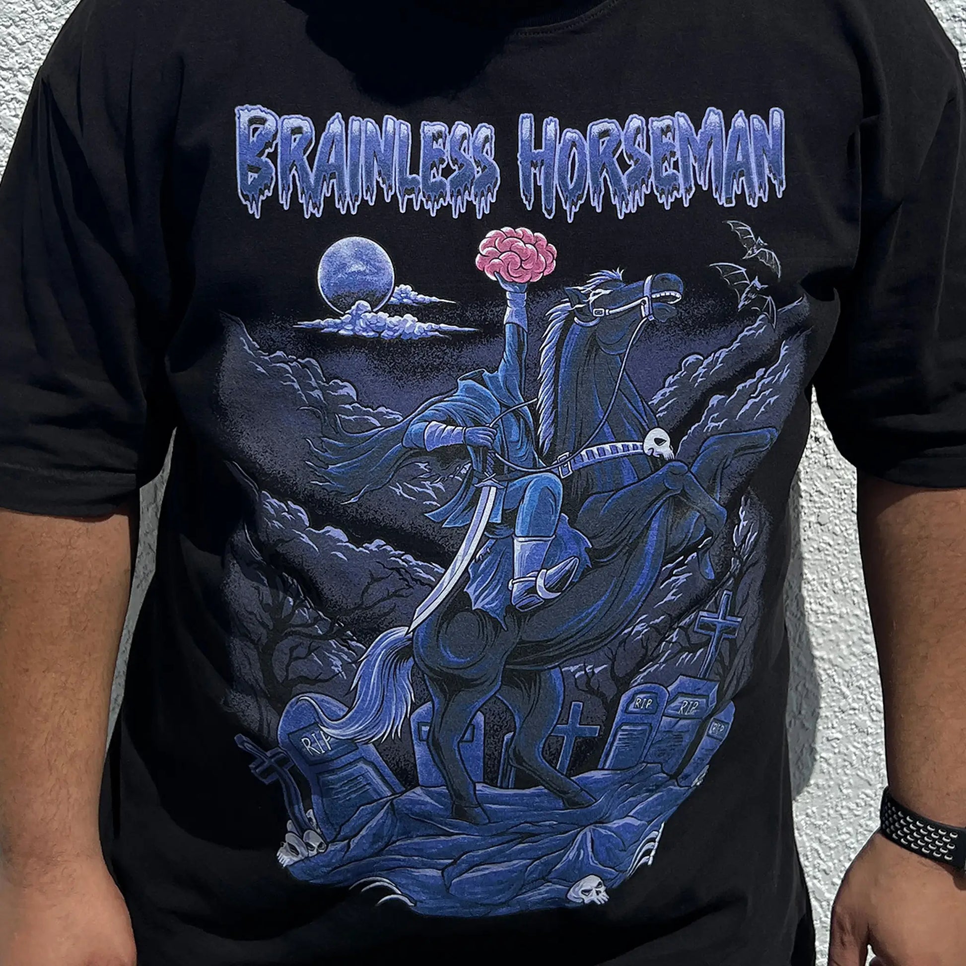 A Wandering Mind Brainless Horseman t-shirt in black front view worn on model