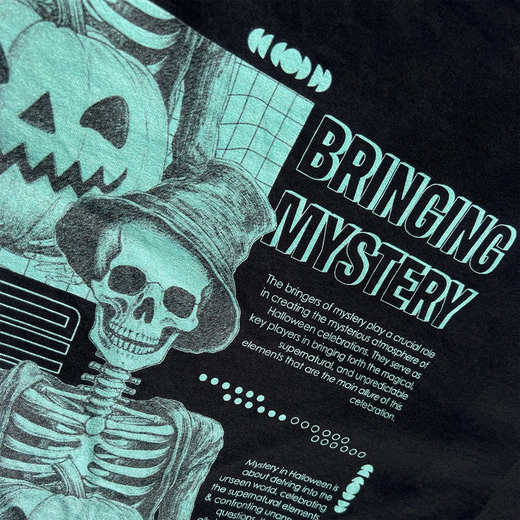 A Wandering Mind Bringing Mystery t-shirt in black back graphic detail showing skeletal figure, jack-o’-lantern, grid layout