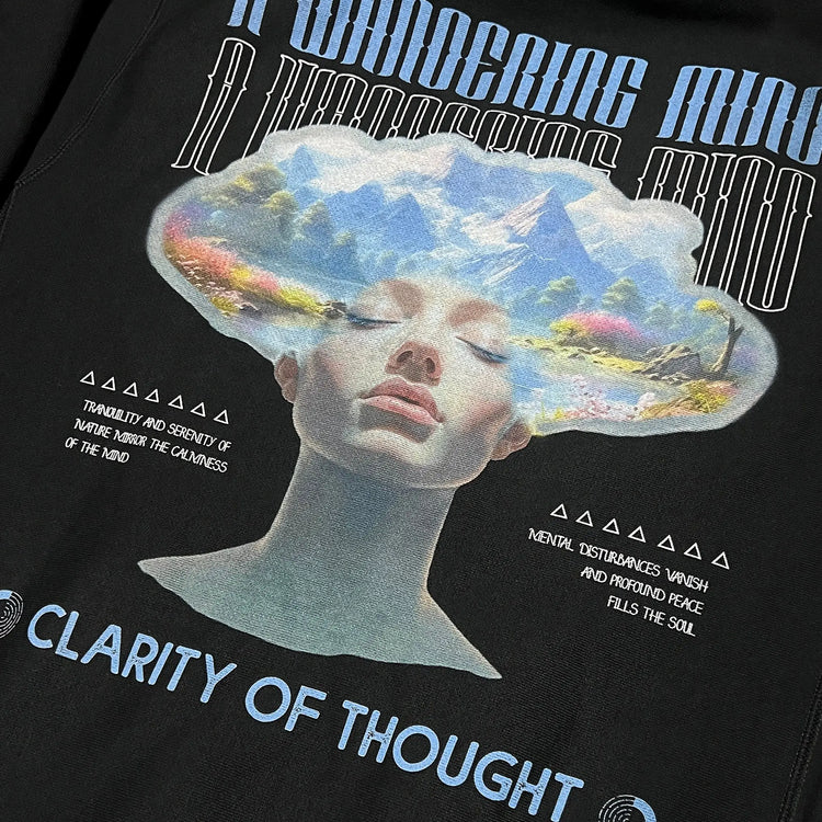 A Wandering Mind Clarity of Thought hoodie in black back graphic angled view of human profile, mountains, lake