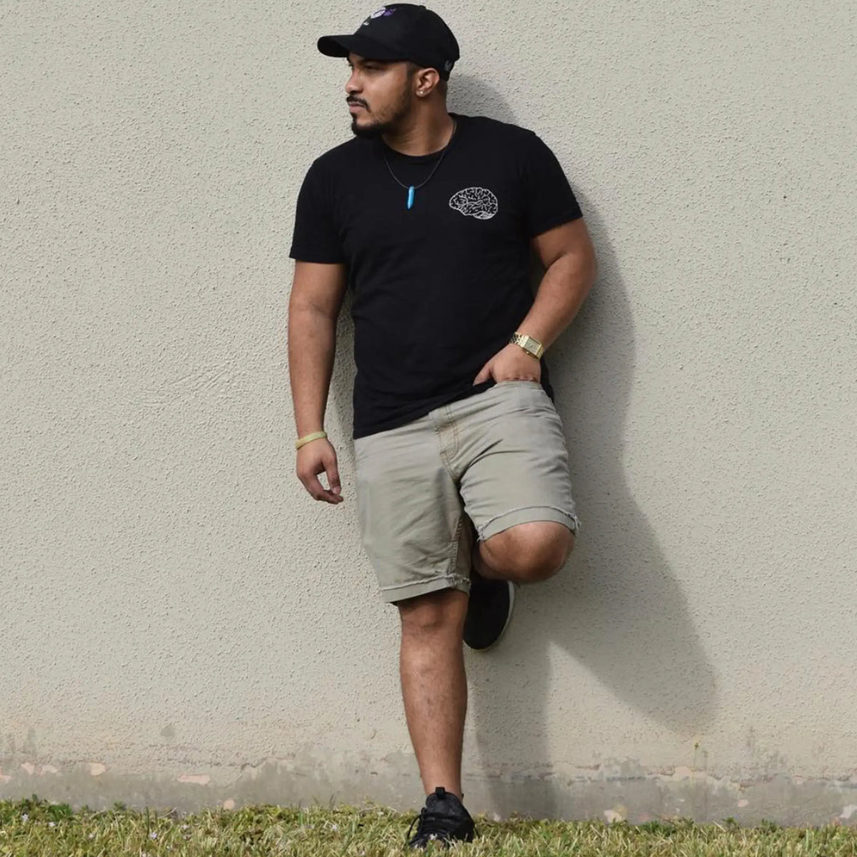 A Wandering Mind Classic Brain White Logo t-shirt in black front view worn on model