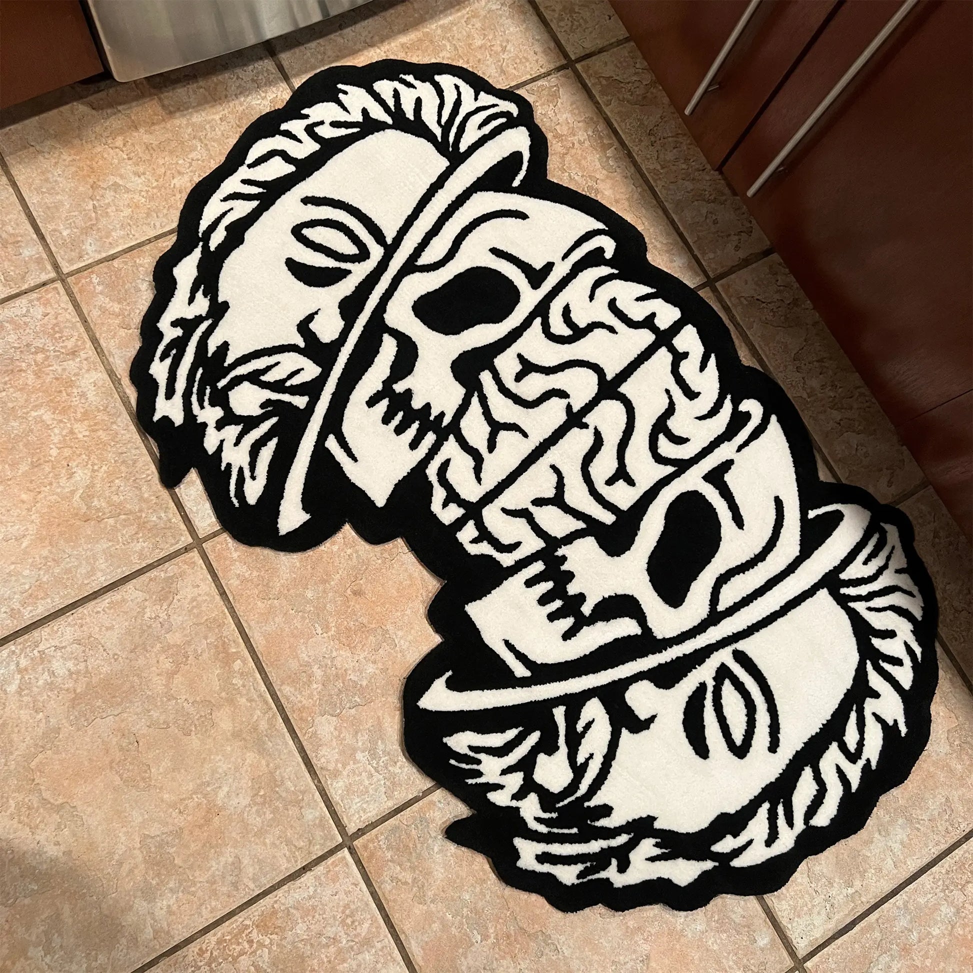 A Wandering Mind Divided Self rug in black and white angled view of face, skull, brain