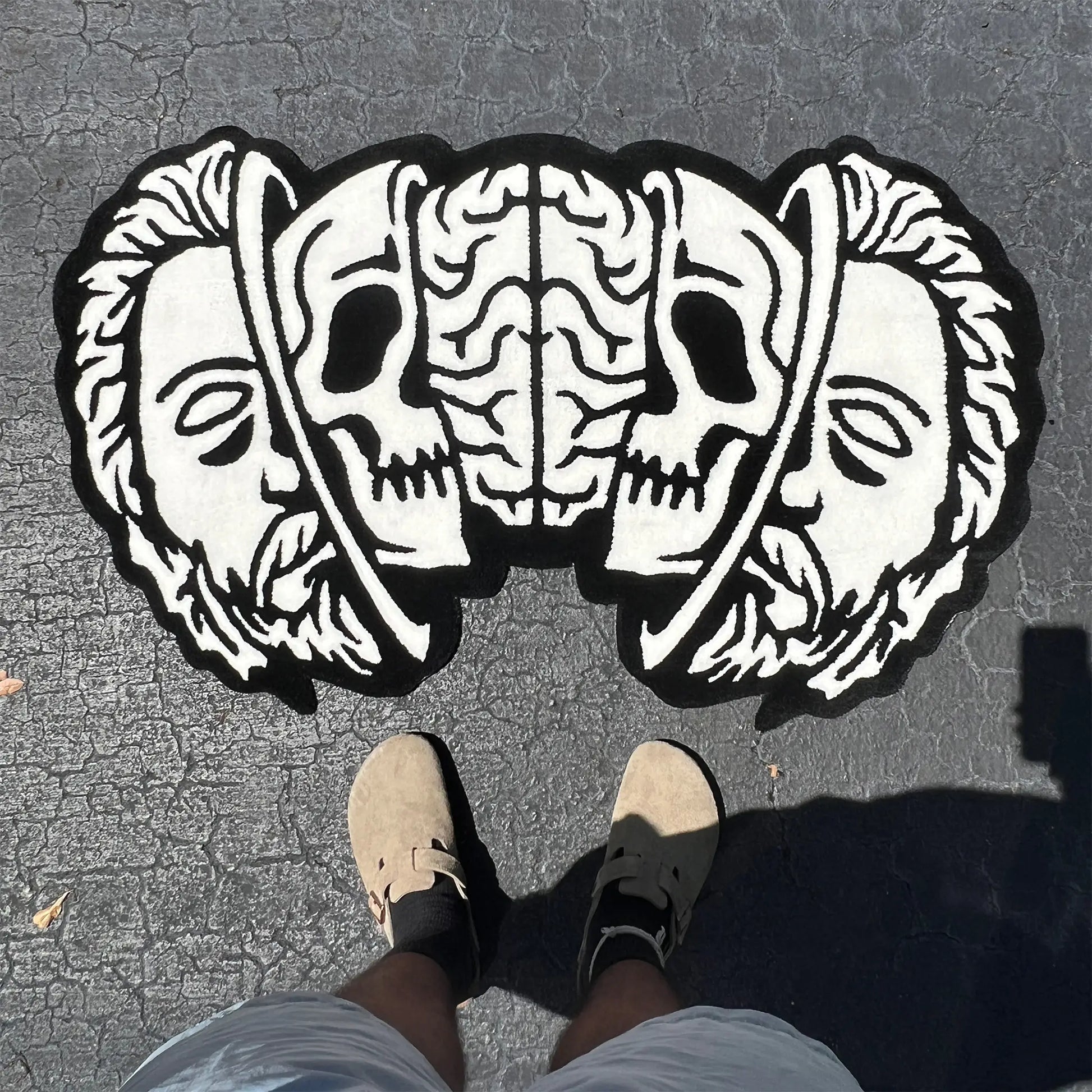 A Wandering Mind Divided Self rug in black and white full view