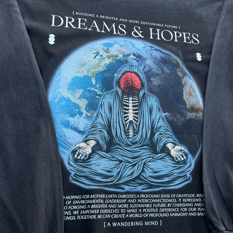 A Wandering Mind Dreams and Hopes long sleeve t-shirt in vintage black front graphic angled view of robed figure, exposed brain, globe