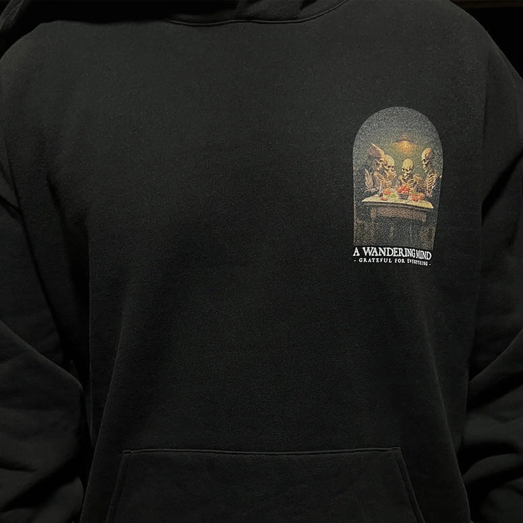 A Wandering Mind Grateful for Everything hoodie in black front view worn on model