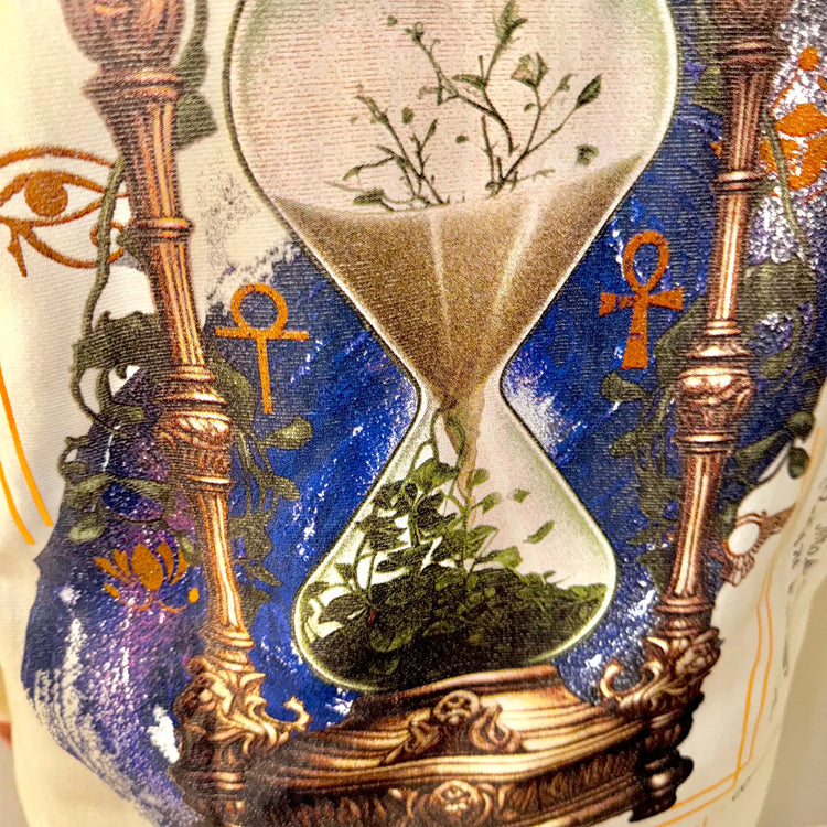 A Wandering Mind Growth and Renewal hoodie in bone back graphic detail print texture showing hourglass, foliage, symbolic elements