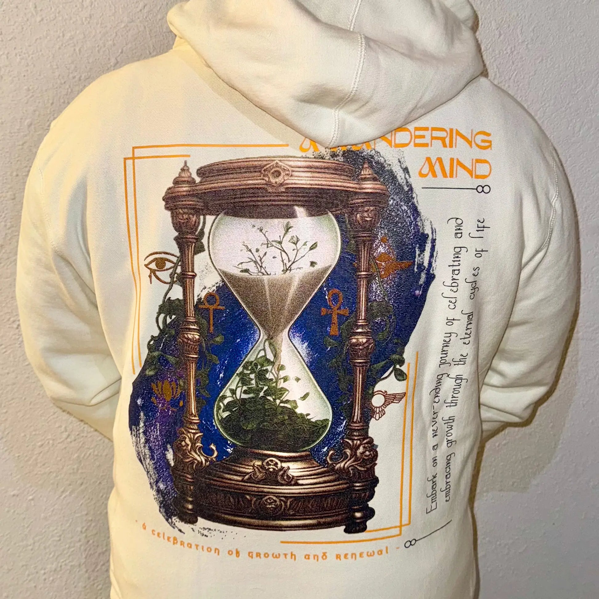 A Wandering Mind Growth and Renewal hoodie in bone back view worn on model