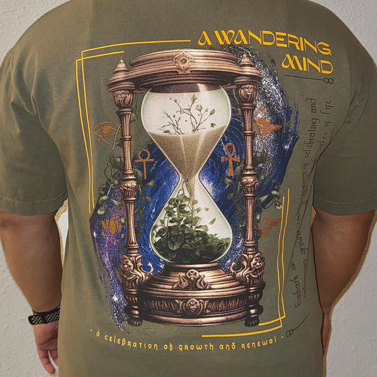 A Wandering Mind Growth & Renewal t-shirt in olive back view worn on model