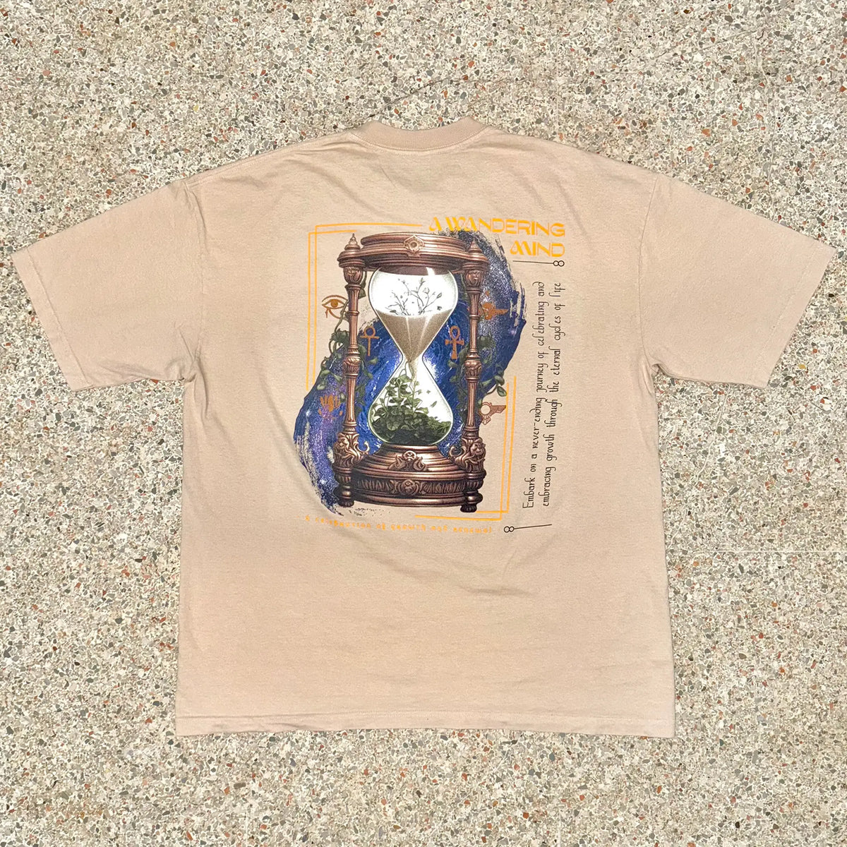 A Wandering Mind Growth & Renewal t-shirt in sand back view
