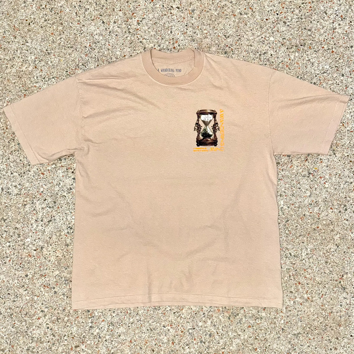 A Wandering Mind Growth & Renewal t-shirt in sand front view