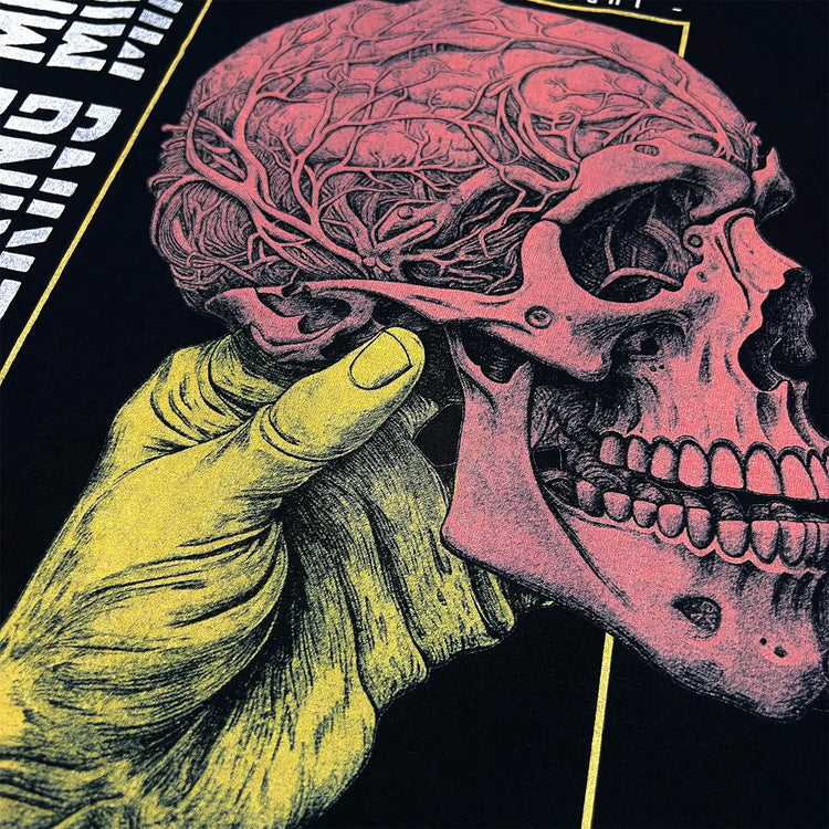 A Wandering Mind Mastery of Thought long sleeve t-shirt in black back graphic detail showing hand holding skull, exposed brain