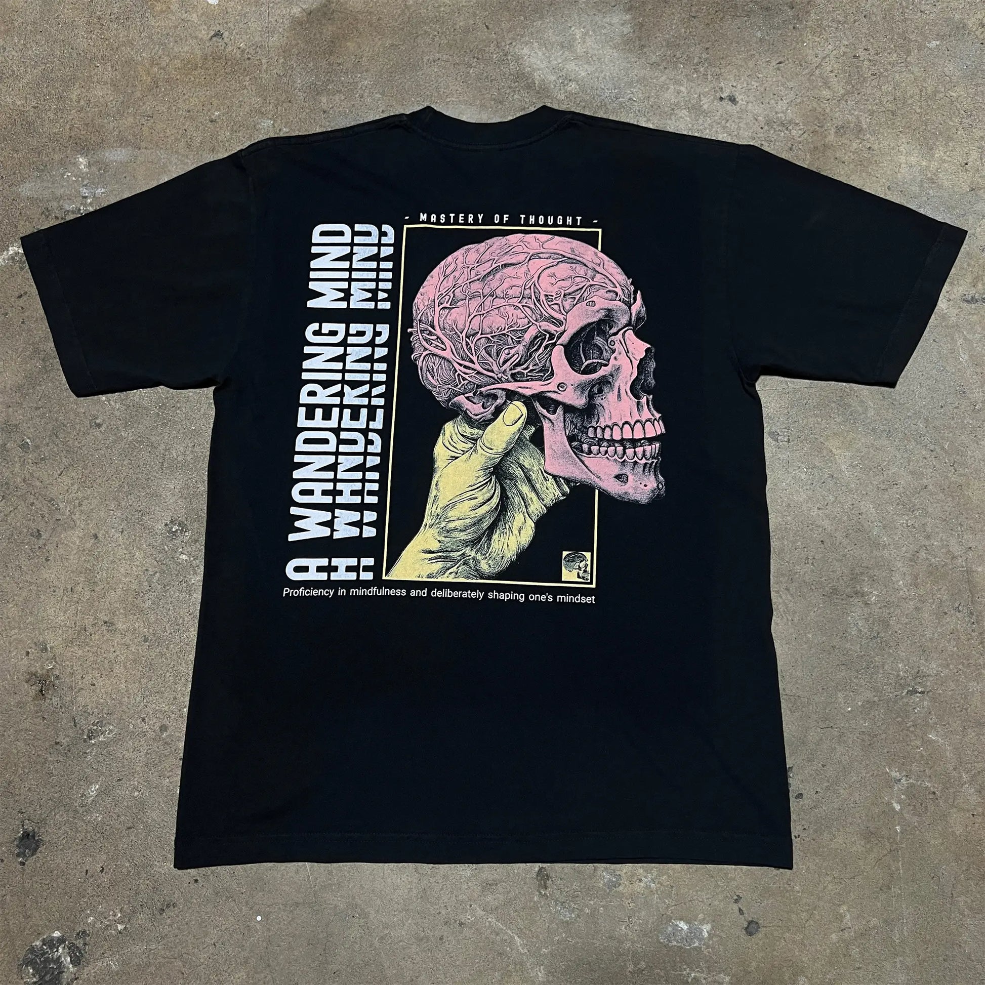 A Wandering Mind Mastery of Thought t-shirt in black back view
