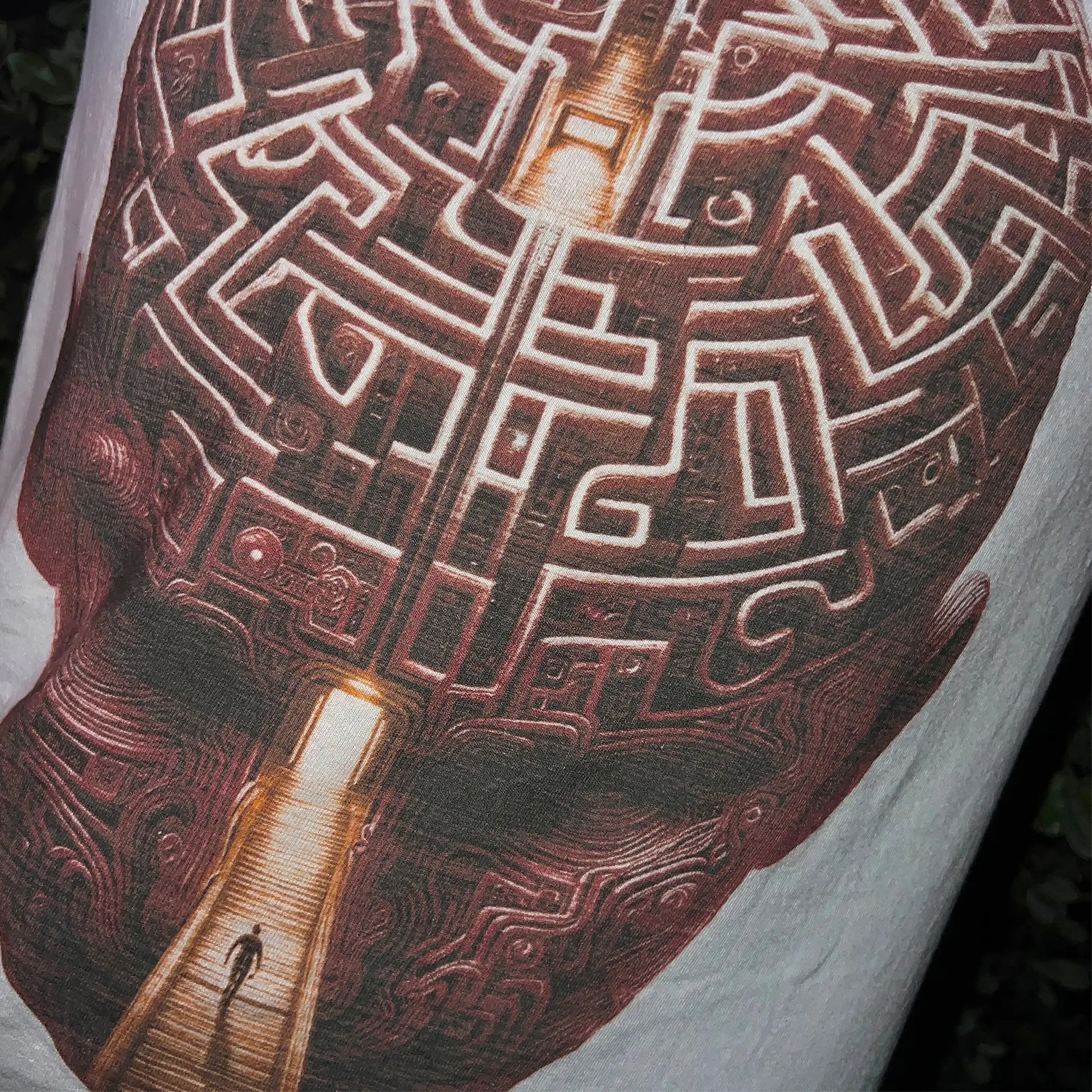 A Wandering Mind Mindful Maze t-shirt in white front graphic detail showing human head maze, staircase