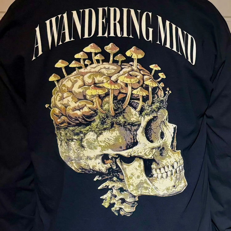A Wandering Mind Rebirth t-shirt in black back view worn on model