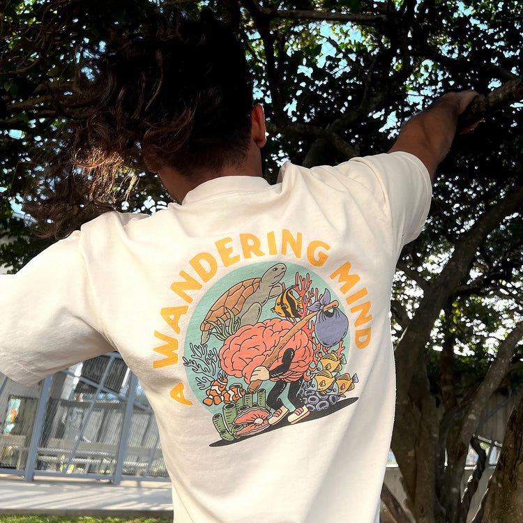 A Wandering Mind Sunken Thoughts t-shirt in bone back view worn on model
