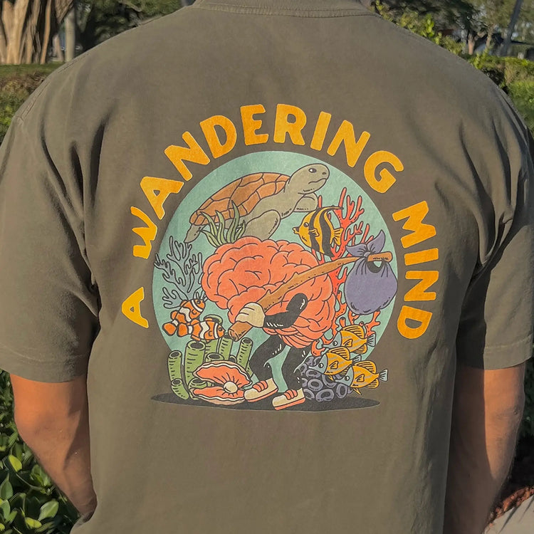 A Wandering Mind Sunken Thoughts t-shirt in olive back view worn on model