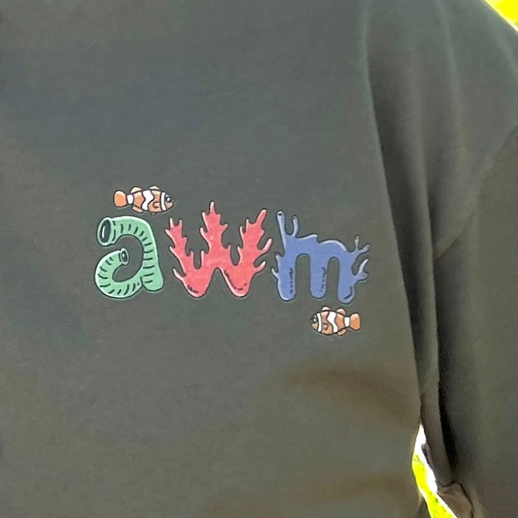 A Wandering Mind Sunken Thoughts t-shirt in olive front graphic detail showing clownfish, reef typography, sea life