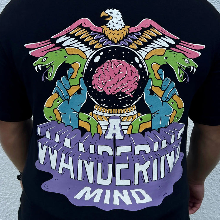 A Wandering Mind The Mystic t-shirt in black back view worn on model