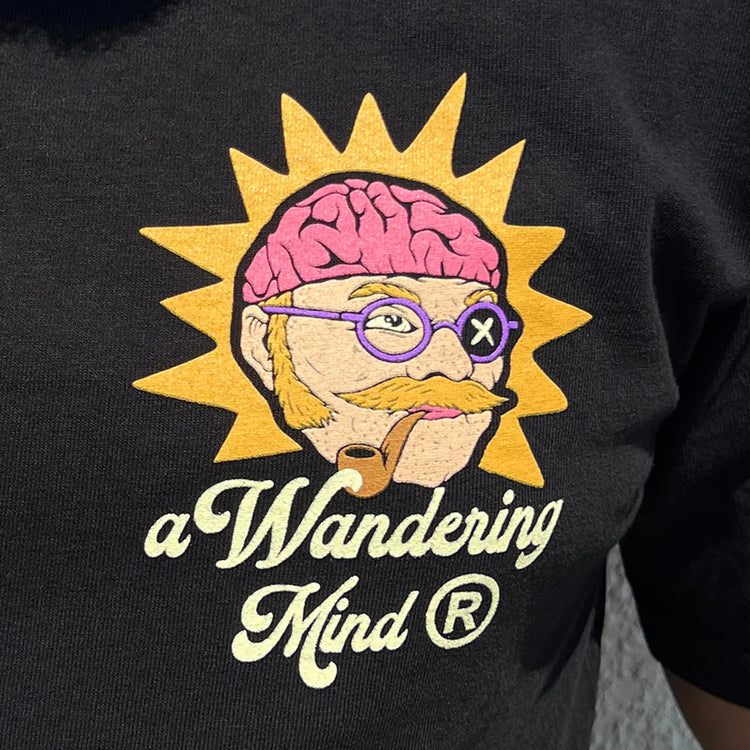 A Wandering Mind The Sailor t-shirt in black front graphic detail showing sailor with exposed brain