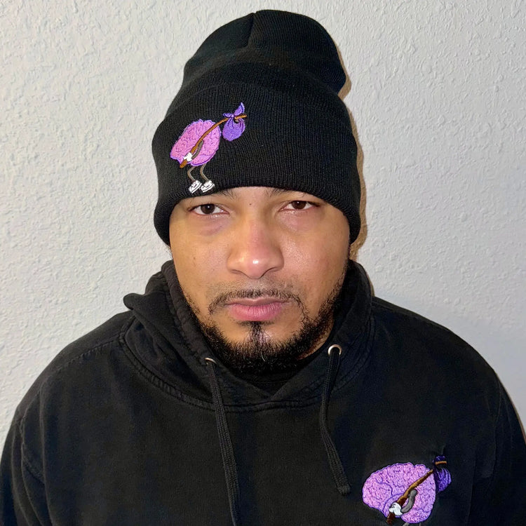 A Wandering Mind Wandering beanie in black front view worn on model