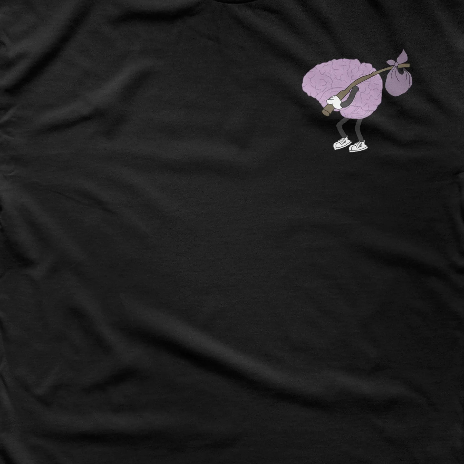 A Wandering Mind Wandering Logo Brain t-shirt in black front graphic detail showing wandering brain character